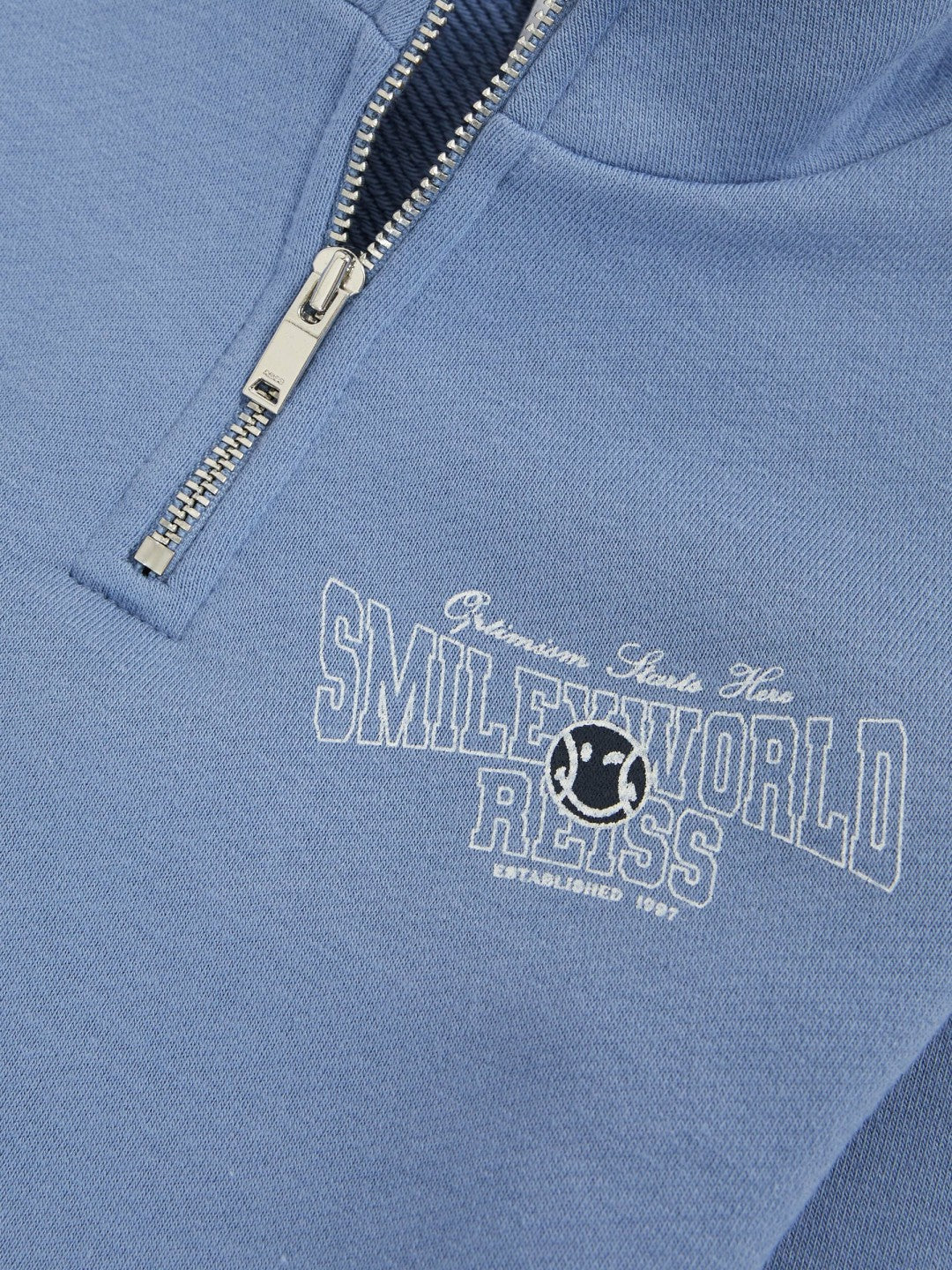 3-9 yrs SmileyWorld Half-Zip Sweatshirt Unisex Fit in Blue | Reiss Children & Baby Signature