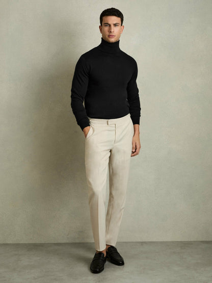 Slim Fit Merino Wool Roll Neck Jumper in Black | Reiss Men Featured