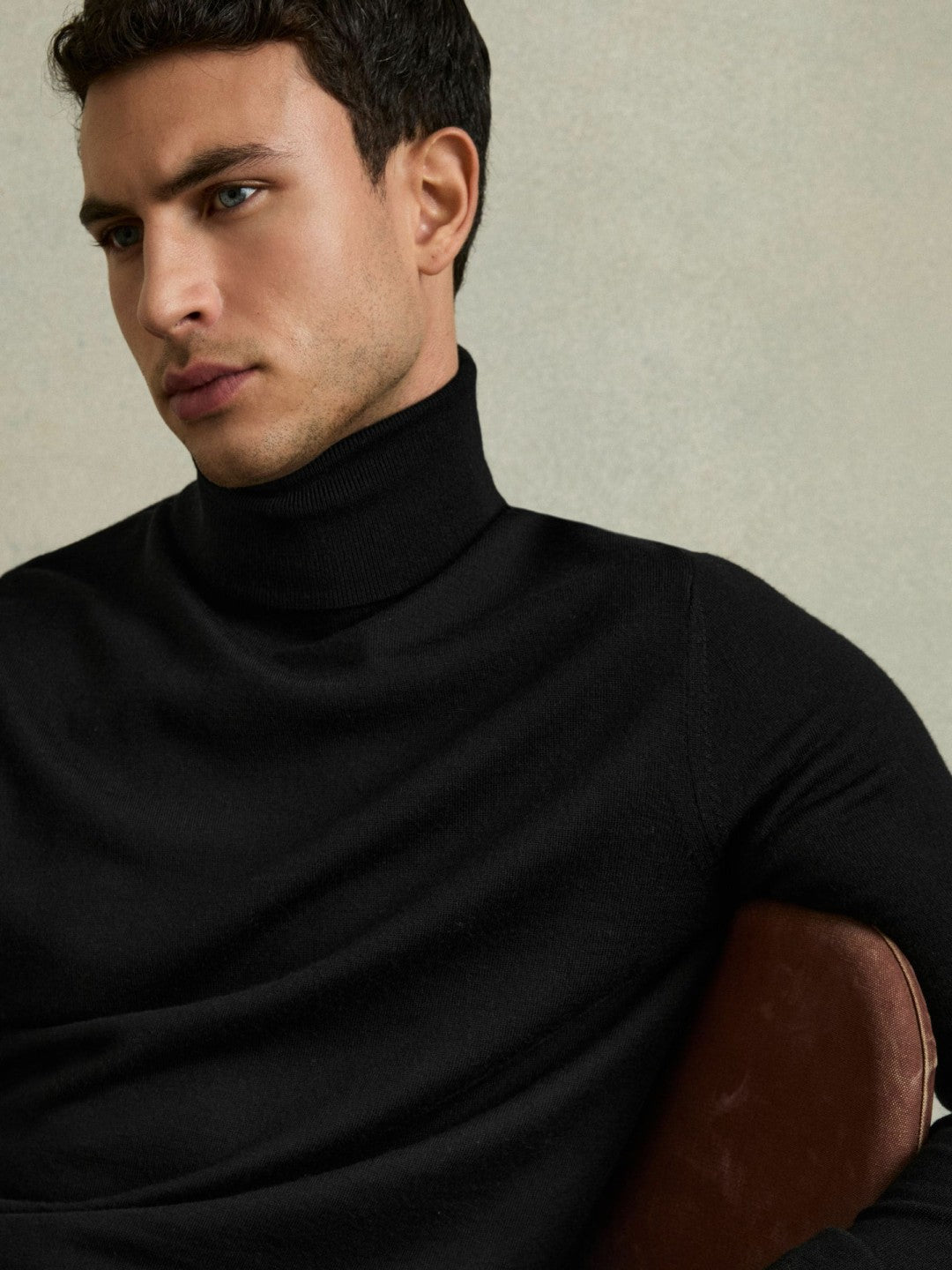 Slim Fit Merino Wool Roll Neck Jumper in Black | Reiss Men Featured