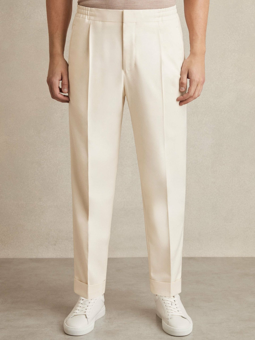 Relaxed-Fit Pleated Tapered Trousers in Ecru | Reiss Men Signature