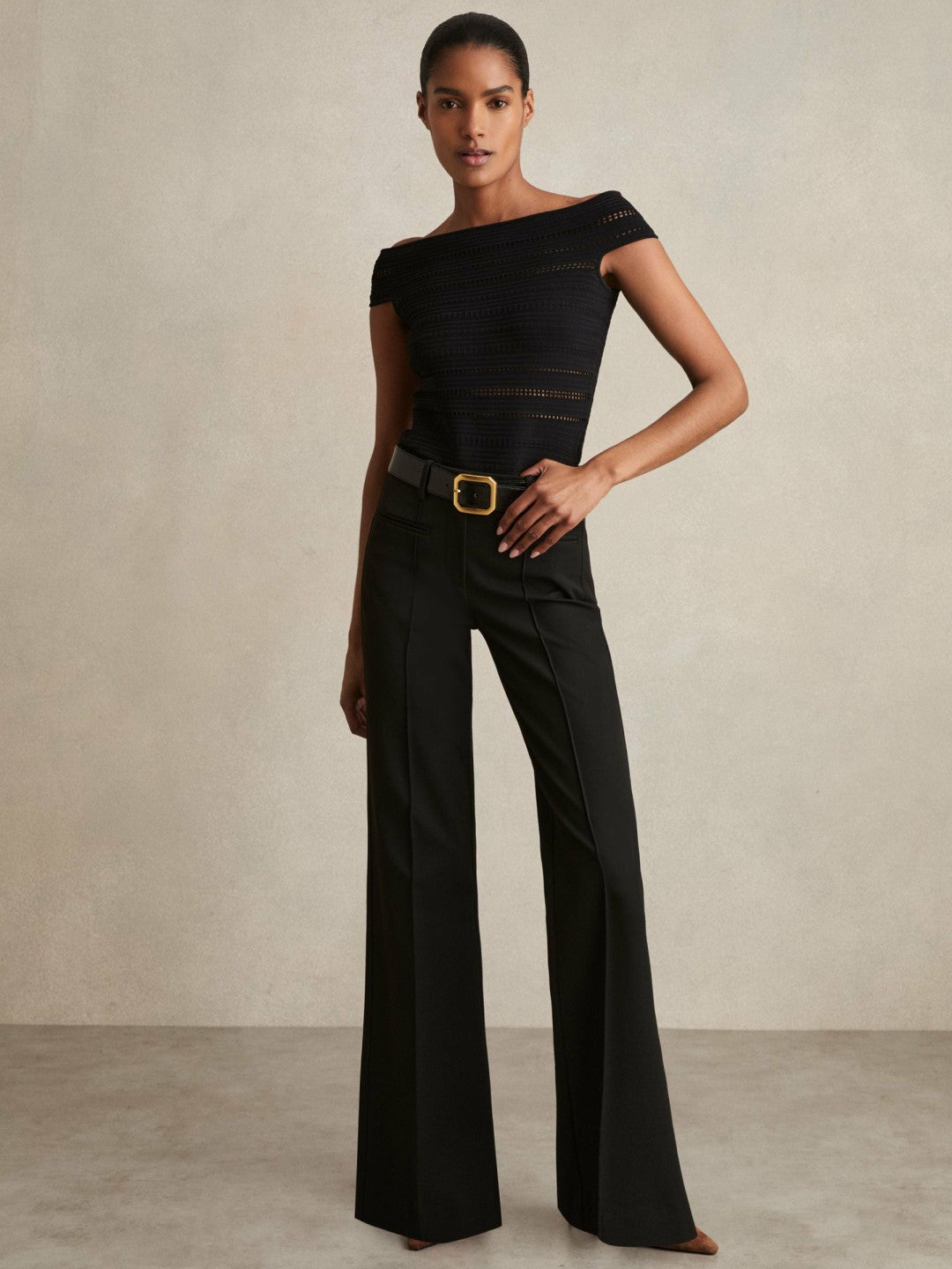 Petite High Rise Flared Trousers in Black | Reiss Women Trending