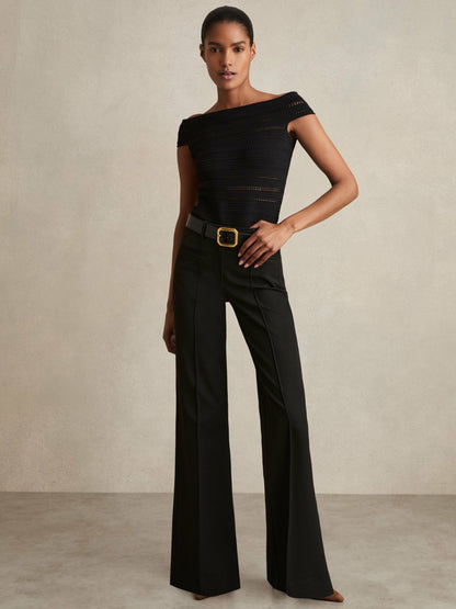 Petite High Rise Flared Trousers in Black | Reiss Women Trending