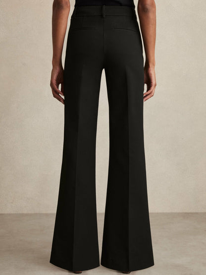 Petite High Rise Flared Trousers in Black | Reiss Women Trending
