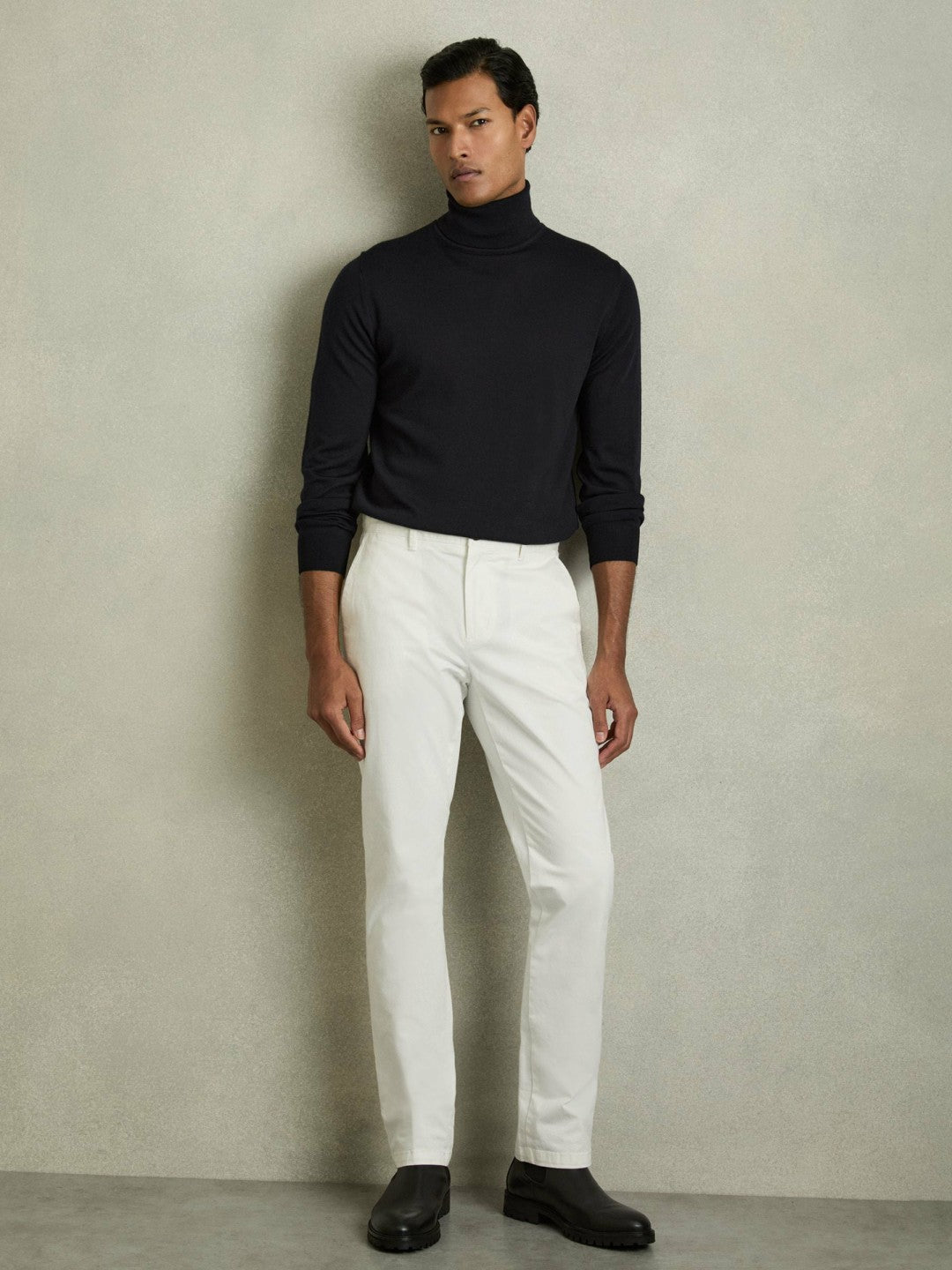 Slim Fit Merino Wool Roll Neck Jumper in Navy | Reiss Men Trending