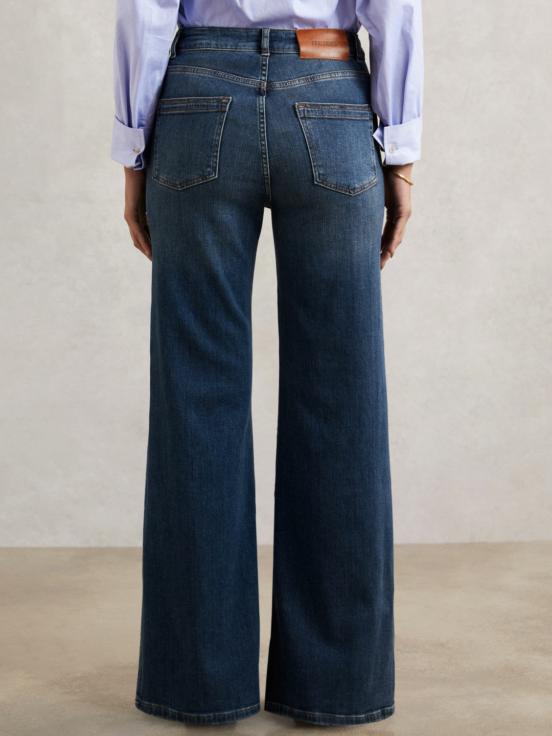 Petite Mid-Rise Flared Jeans in Mid Blue | Reiss Women Recommended