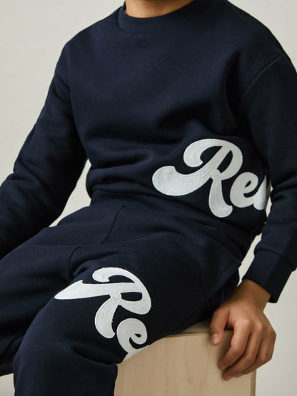 13-14 yrs Cotton-Blend Logo Script Joggers in Navy | Reiss Children & Baby Recommended