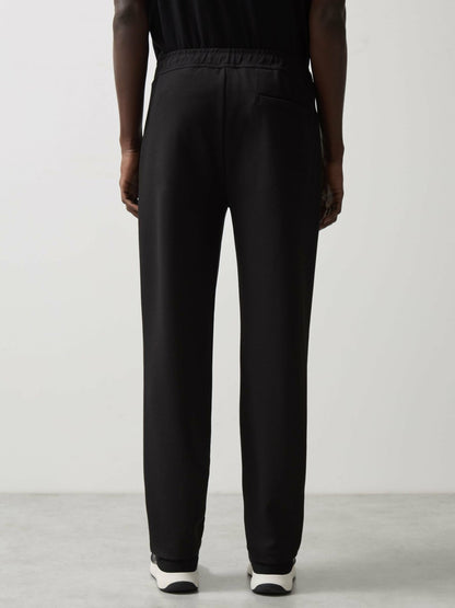 McLaren F1 Team Interlock Joggers in Black | Reiss Men Trending