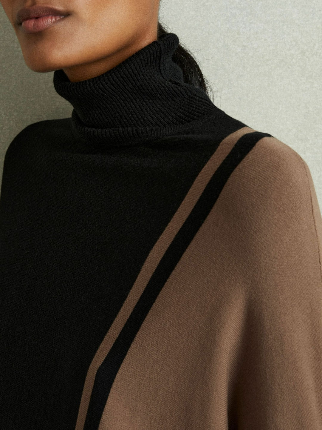 Colourblock Roll Neck Split Hem Jumper in Black/Mink | Reiss Women Featured