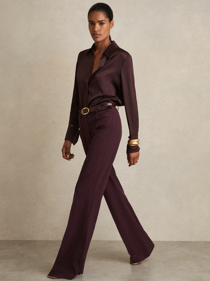 Petite High Rise Flared Trousers in Burgundy | Reiss Women Signature