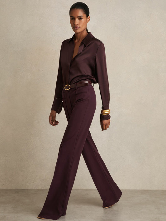 Petite High Rise Flared Trousers in Burgundy | Reiss Women Signature