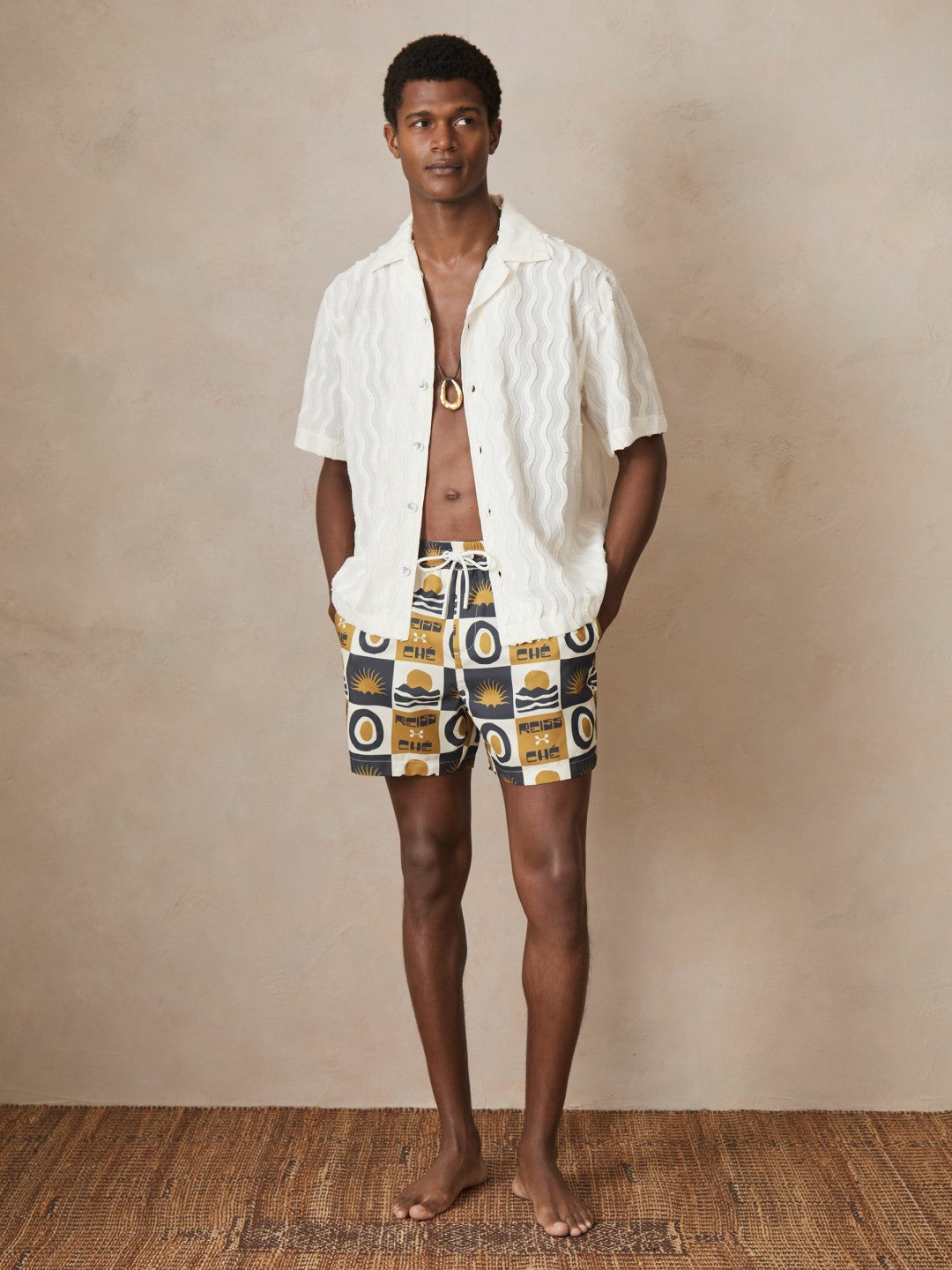 | Ché Sunset-Print Swim Shorts in Olive Green | Reiss Men Exclusive