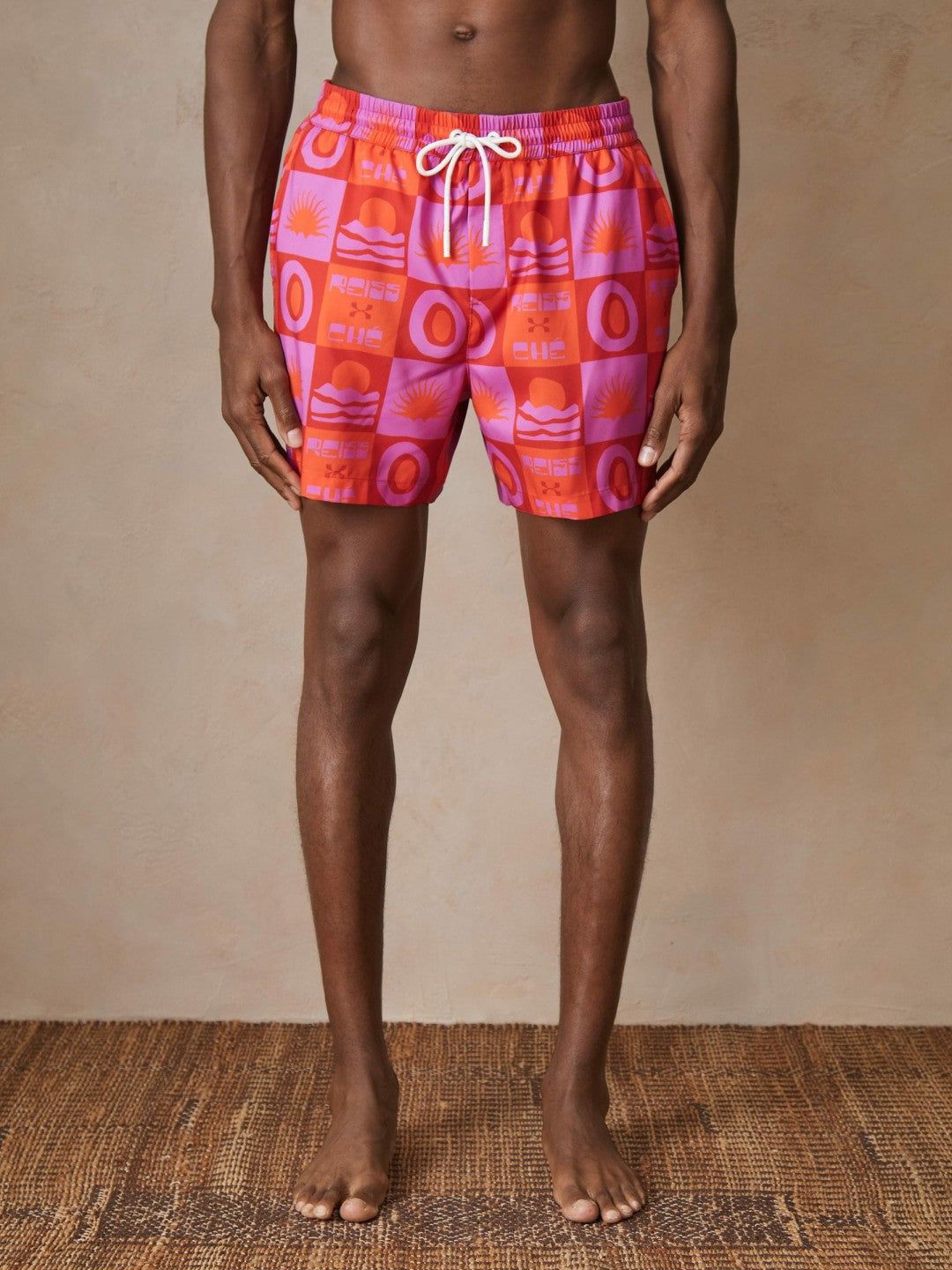 | Ché Sunset-Print Swim Shorts in Orange/Pink | Reiss Men Recommended