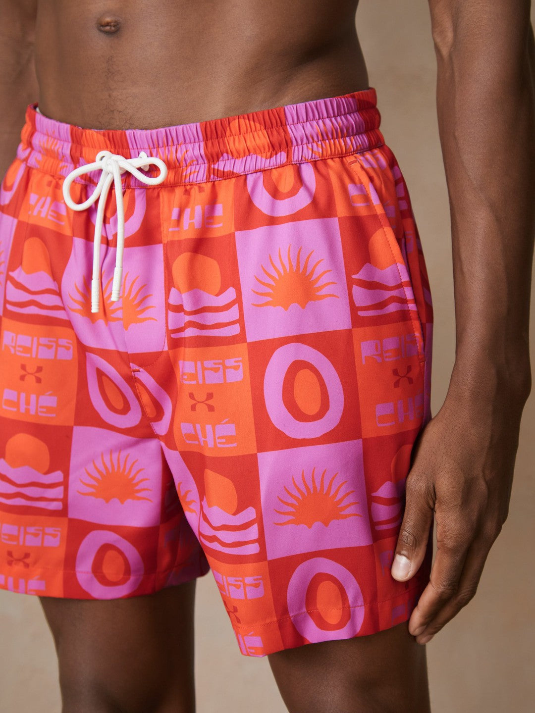 | Ché Sunset-Print Swim Shorts in Orange/Pink | Reiss Men Recommended