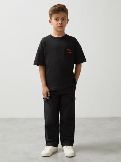 3-9 yrs Unisex Fit Oversized McLaren F1 Team Tyre T-Shirt in Black | Reiss Children & Baby Premium
