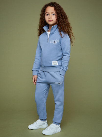 9-13 yrs SmileyWorld Cuffed Joggers Unisex Fit in Blue | Reiss Children & Baby Exclusive