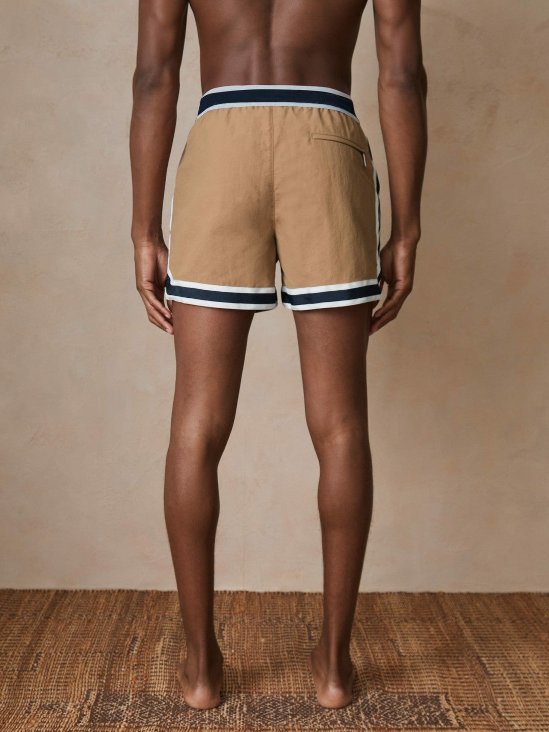 | Ché Stripe-Trim Swim Shorts in Camel | Reiss Men New