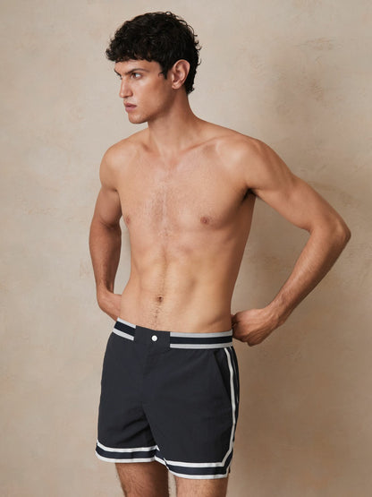 | Ché Stripe-Trim Swim Shorts in Navy | Reiss Men Premium