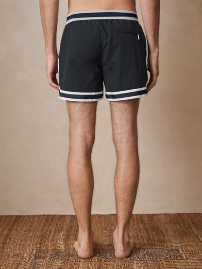 | Ché Stripe-Trim Swim Shorts in Navy | Reiss Men Premium