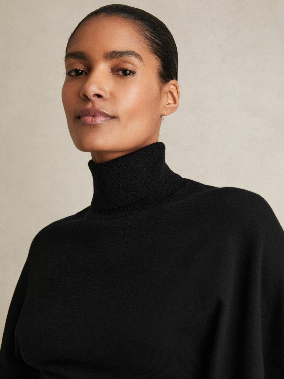 Merino Wool Batwing Roll-Neck Jumper in Black | Reiss Women Recommended