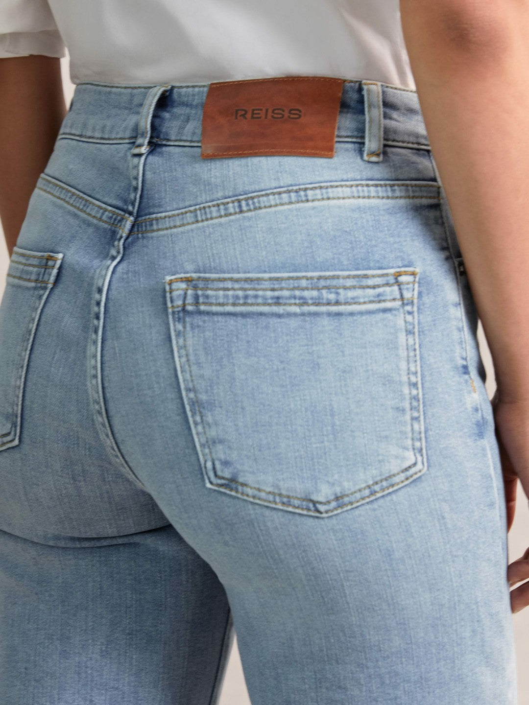 Petite Mid-Rise Flared Jeans in Light Blue | Reiss Women Premium