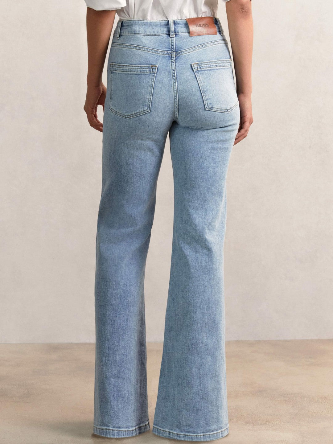 Petite Mid-Rise Flared Jeans in Light Blue | Reiss Women Premium