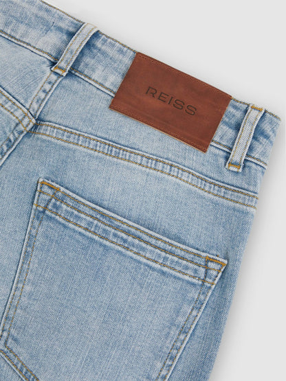 Petite Mid-Rise Flared Jeans in Light Blue | Reiss Women Premium