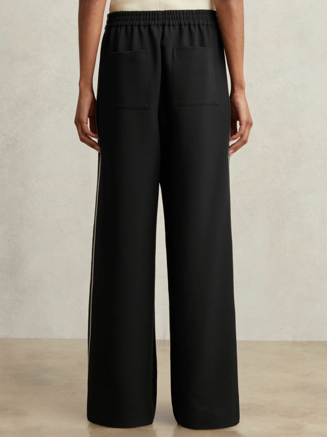 Petite Side-Stripe Wide-Leg Trousers in Black | Reiss Women Exclusive