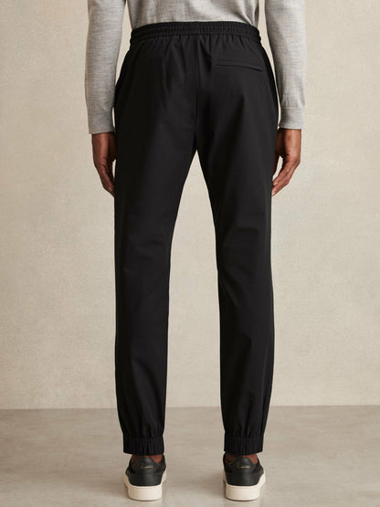 Drawstring Technical Cuffed Trousers in Black | Reiss Men Featured