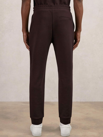 Interlock Drawstring Joggers in Cherry Red | Reiss Men Recommended