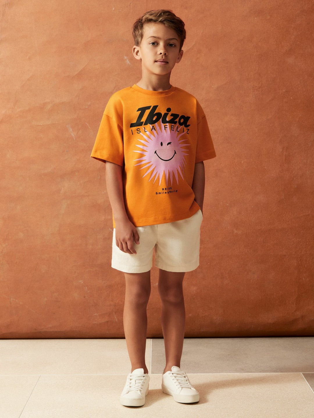 9-13 yrs SmileyWorld Sun Motif T-Shirt in Orange | Reiss Children & Baby Signature