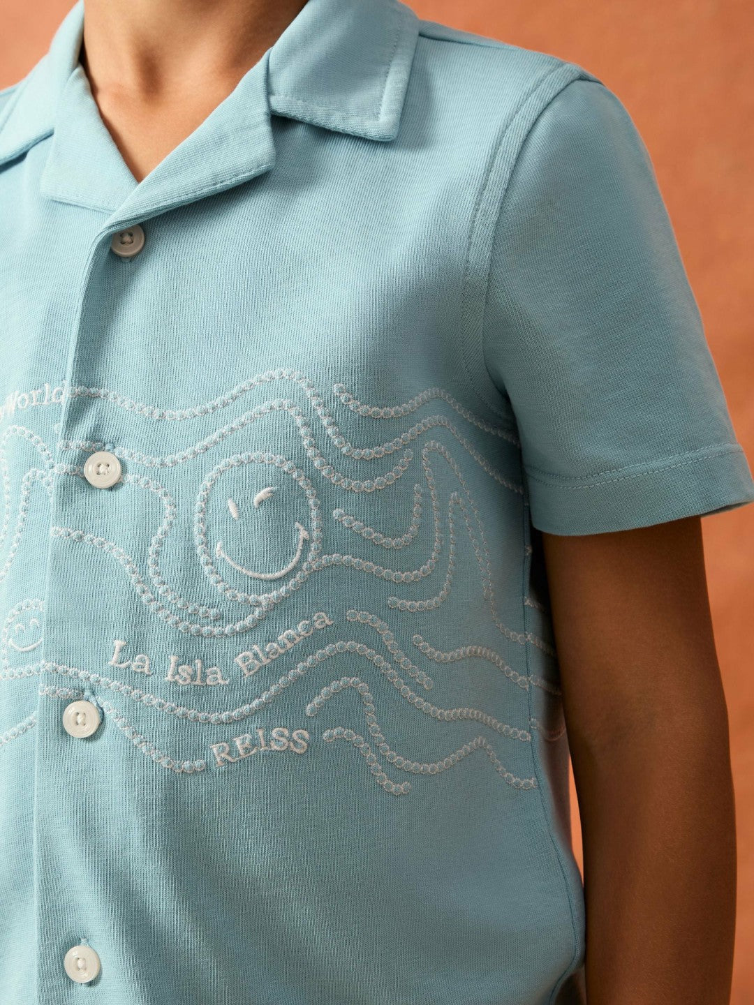 9-13 yrs SmileyWorld Embroidered Shirt in Sky Blue | Reiss Children & Baby Featured