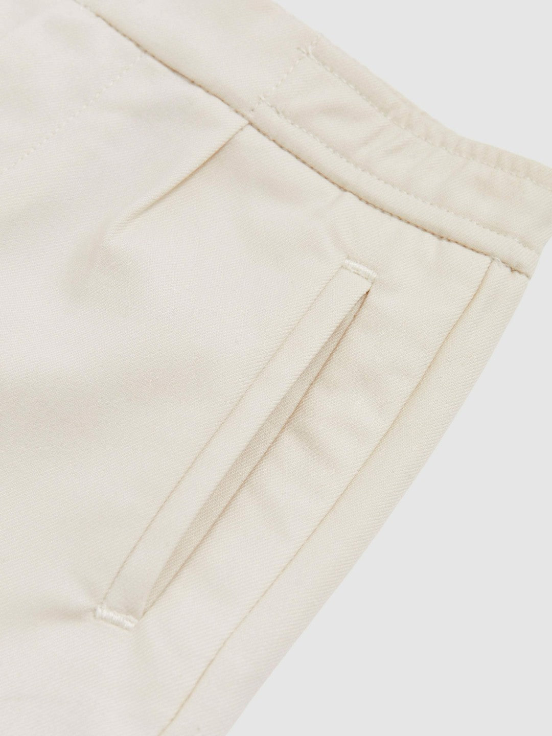 9-13 yrs Relaxed-Fit Pleated Tapered Trousers in Off White | Reiss Children & Baby Premium