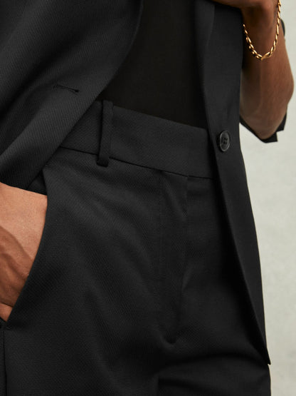 Wool-Blend Tailored Flared Suit Trousers in Black | Reiss Women Recommended