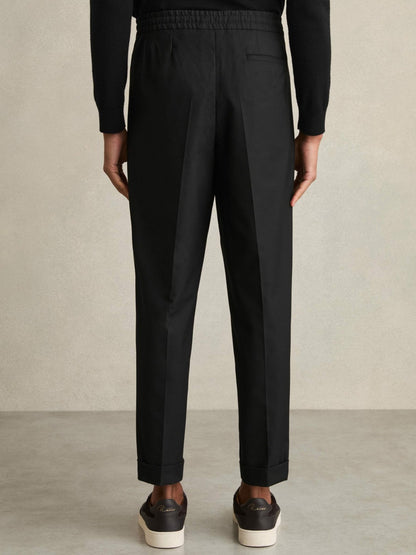 Relaxed-Fit Pleated Tapered Trousers in Black | Reiss Men Popular