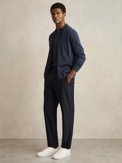 Relaxed-Fit Pleated Tapered Trousers in Navy | Reiss Men Signature