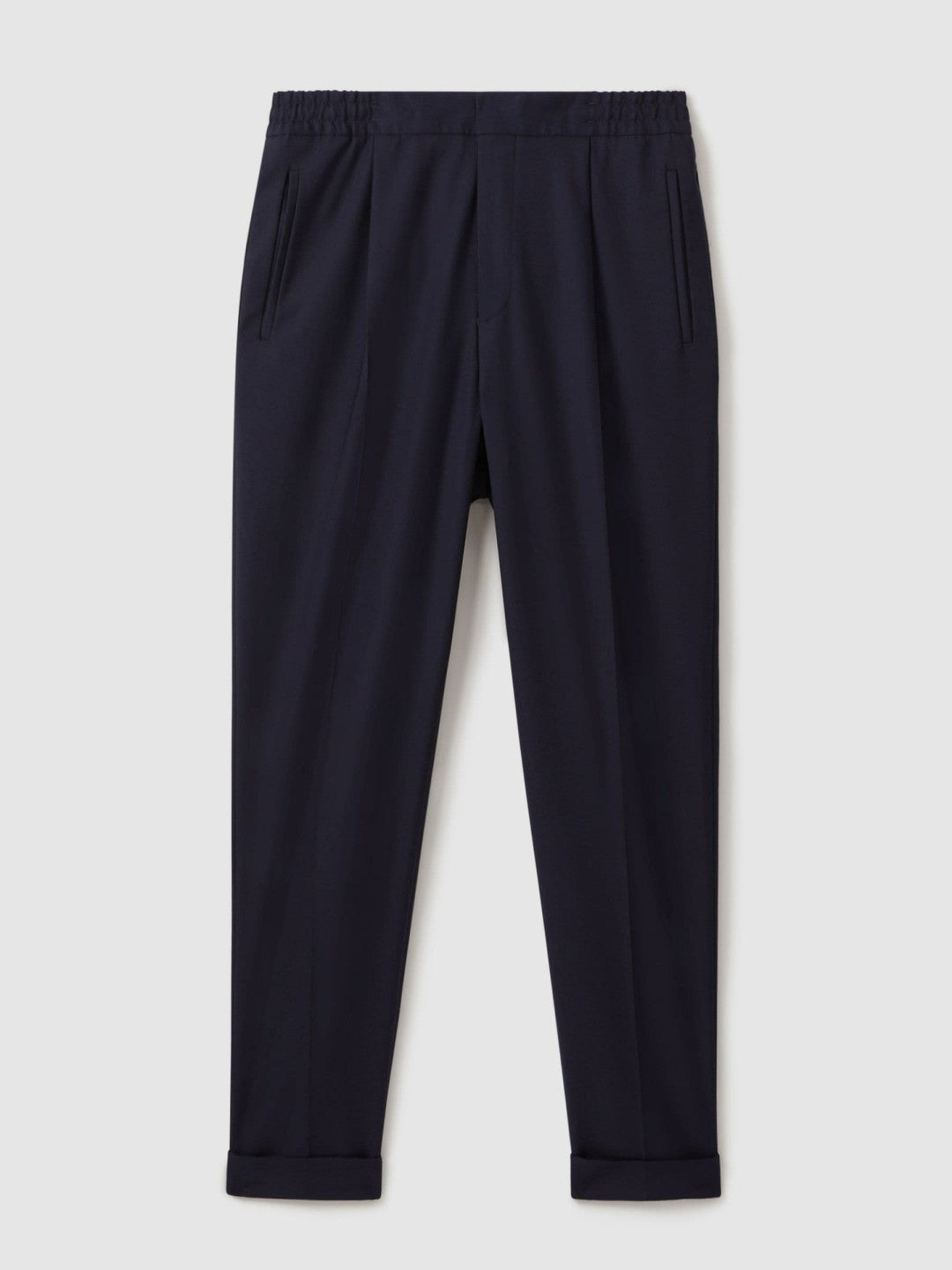 Relaxed-Fit Pleated Tapered Trousers in Navy | Reiss Men Signature