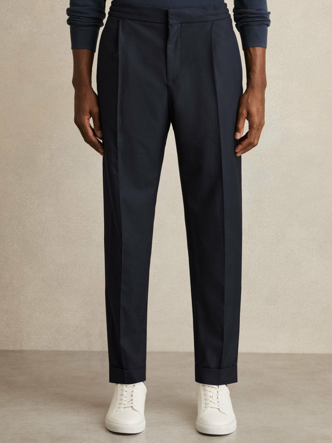 Relaxed-Fit Pleated Tapered Trousers in Navy | Reiss Men Signature