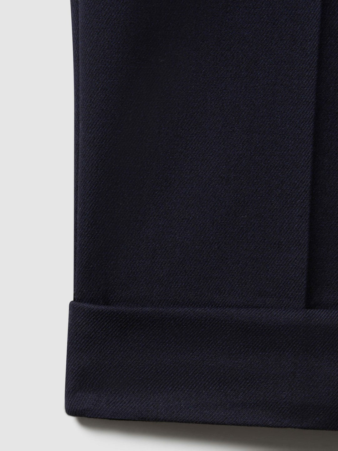 Relaxed-Fit Pleated Tapered Trousers in Navy | Reiss Men Signature