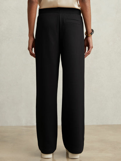 Wide-Leg Interlock Drawstring Joggers in Black | Reiss Women Signature