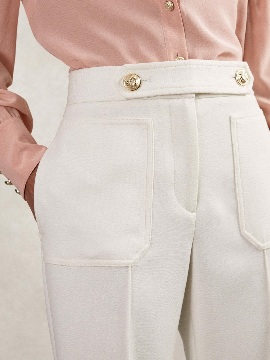 Petite Twill Button-Tab Flared Trousers With Wool in White | Reiss Women Signature