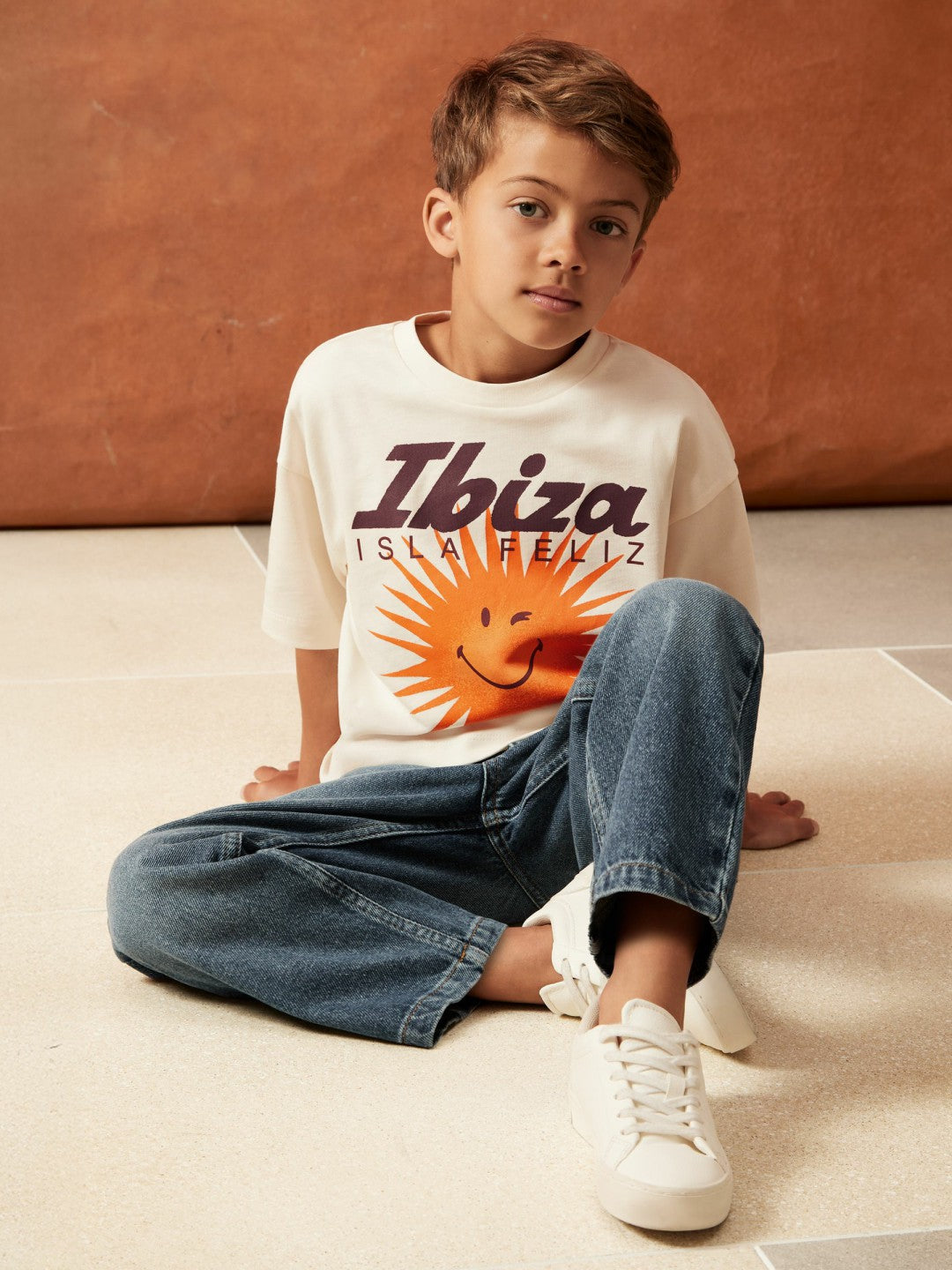 3-9 yrs SmileyWorld Sun Motif T-Shirt in Off White | Reiss Children & Baby Trending