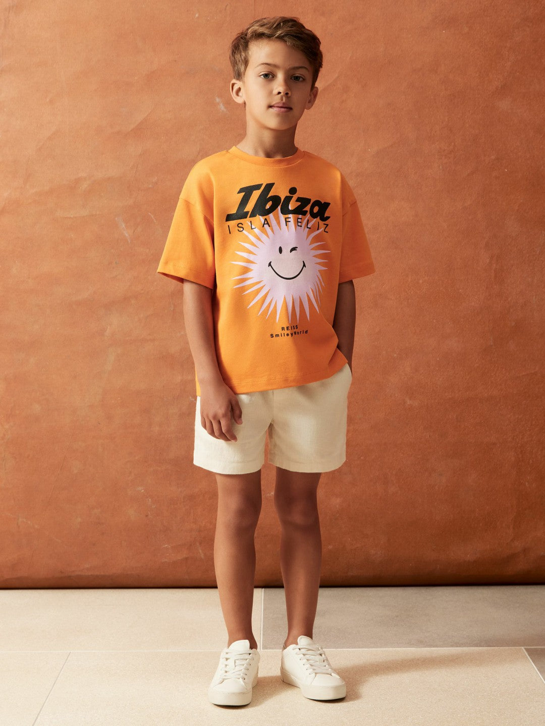 13-14 yrs SmileyWorld Sun Motif T-Shirt in Orange | Reiss Children & Baby Signature