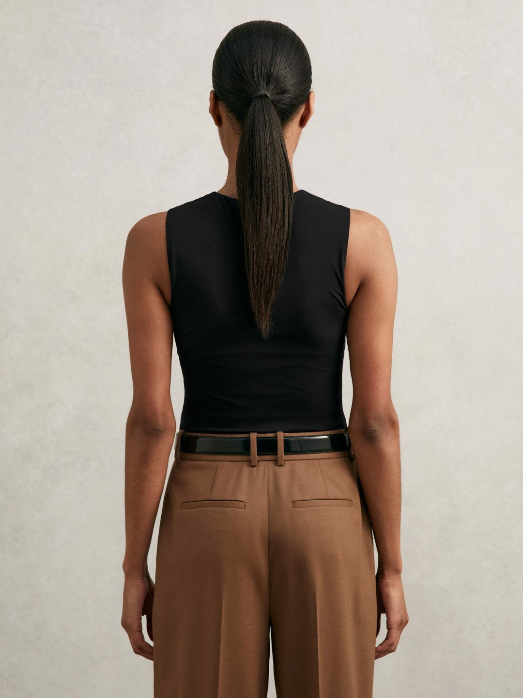 V-Neck Sleeveless Bodysuit in Black | Reiss Women Featured