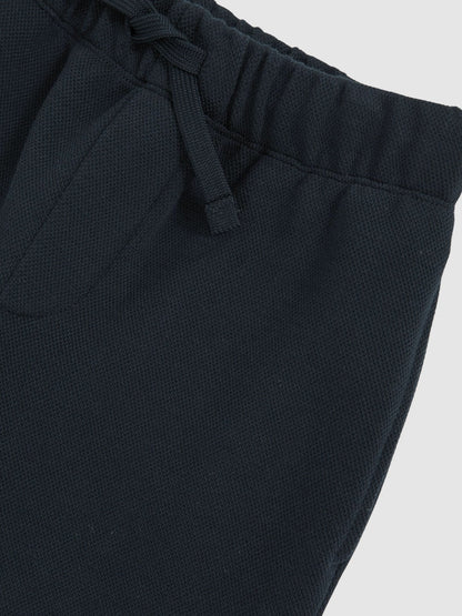 Cotton-Blend Textured Cuffed Joggers in Navy | Reiss Children & Baby Recommended